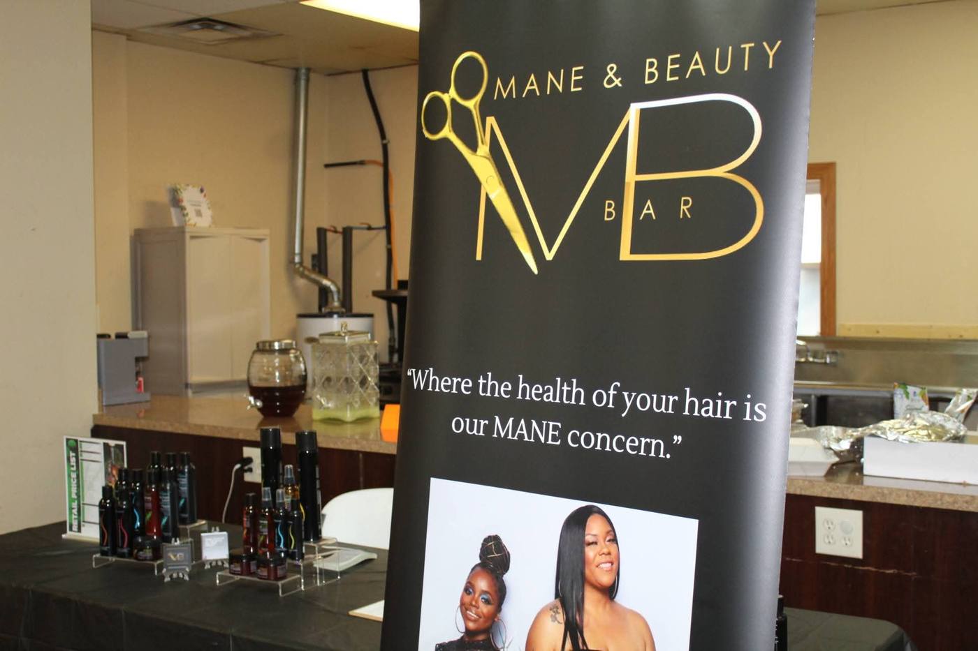 Mane & Beauty Bar vendor banner with hair care products.